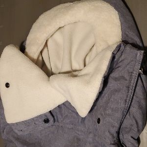 Infant car seat cover to keep baby warm